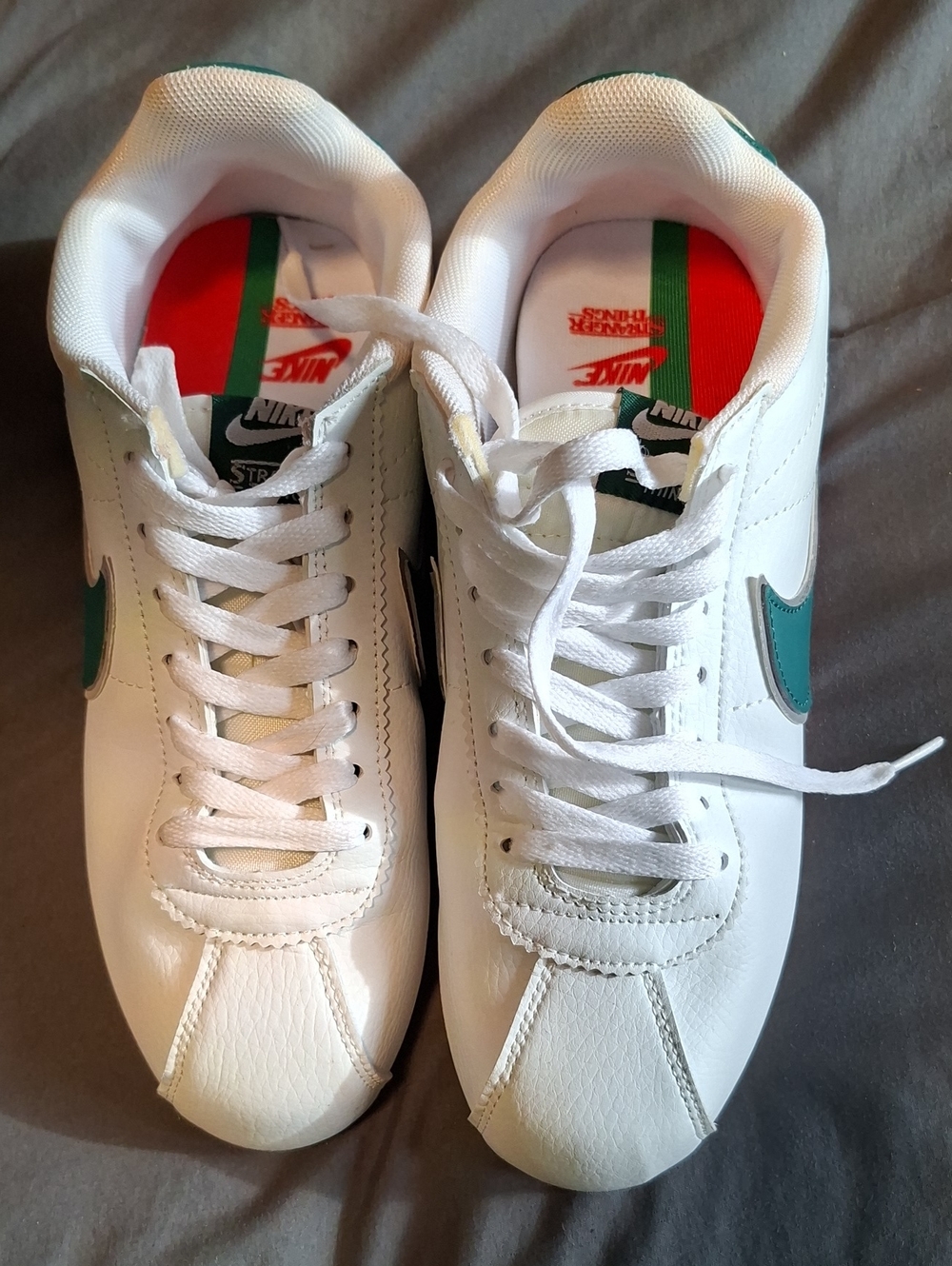 Nike Men’s,Stranger Things, White Sneakers with Teal Swoosh